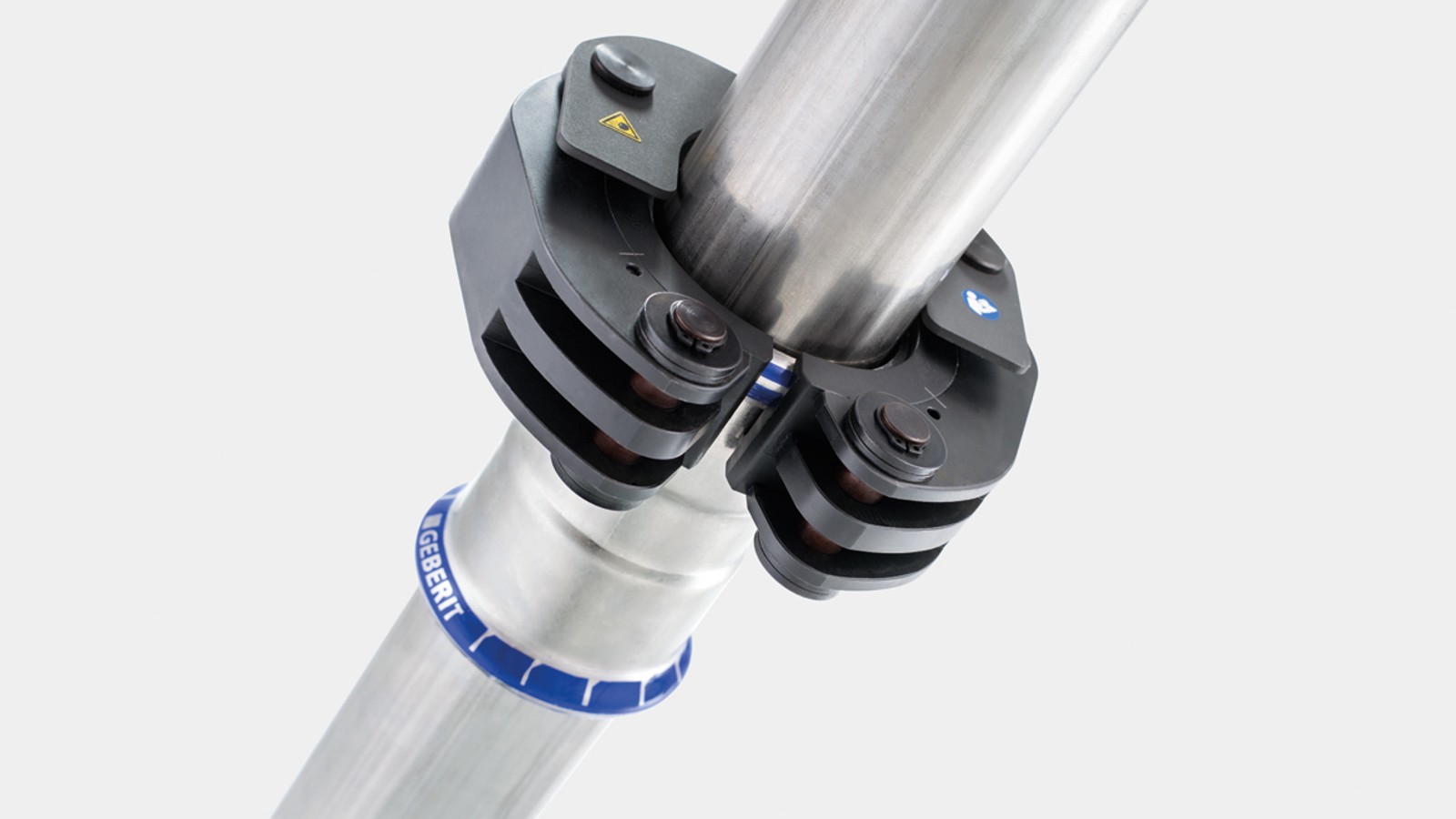 스냅 메커니즘은 Geberit 프레싱 칼라를 Geberit Mapress 피팅에 고정합니다.