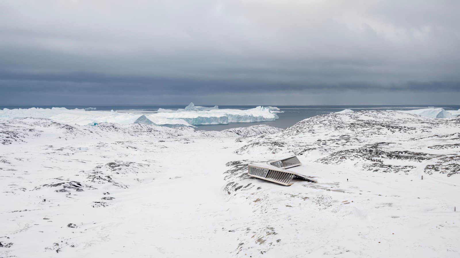 The Ice Fjord Centre is the only building in the middle of the icy landscape (© Adam Mørk) The Ice Fjord Centre is the only building in the middle of the icy landscape (© Adam Mørk)